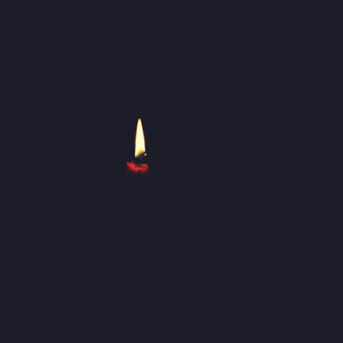 Dying flame in the dark